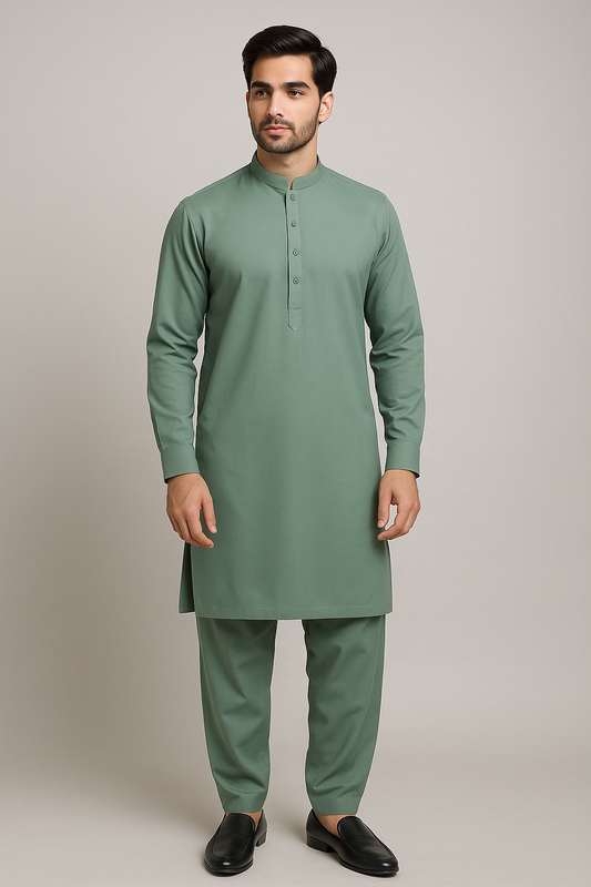 A South Asian male model wearing Grace unstitched cotton suit in soft green (EWD-24)

